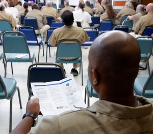 Inmates attend a meeting at the Stafford Creek Corrections Center in Aberdeen, Wash. The state DOC is currently testing staff and incarcerated people at the facility, where at least some TB cases were found.