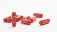 Merck says experimental pill cuts worst COVID-19 effects