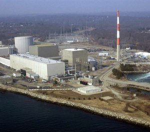 This March 18, 2003, aerial file photo shows the Millstone nuclear power facility in Waterford, Conn. Virginia-based Dominion Energy owns the 550-acre plant, which generates nearly 40 percent of the electricity produced in Connecticut.