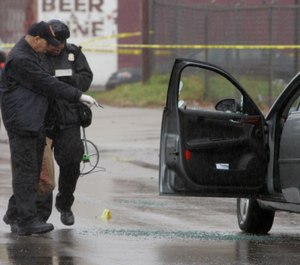 The new rule requires blood and bodily fluids to be washed away with hoses to sewer drains, and first responders should collect bloody clothing other material in collection bags, which they have yet to receive. (AP Photo/Carlos Osorio)