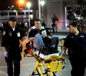 AFG funds can be used to purchase eligible equipment for non-affiliated emergency medical services, including power lift cots. (AP Photo/Noah Berger)