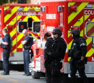 SWAT teams and police respond to reports of a shooting on campus at Ohio State University, Monday, Nov. 28, 2016, in Columbus, Ohio.