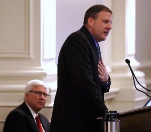 New Hampshire Gov. Chris Sununu, right, speaks to legislators during his budget address at the State House in Concord, N.H., Thursday, Feb. 9, 2017.