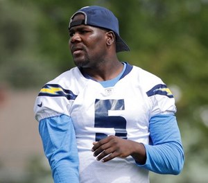 Los Angeles Chargers quarterback Cardale Jones watches after throwing a pass at an NFL football training camp Sunday, July 30, 2017, in Costa Mesa, Calif.