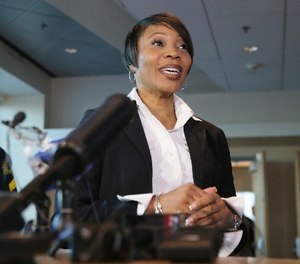 Dallas Police Chief Reneé Hall talks to reporters during an applicant processing event at police headquarters in Dallas, Thursday, Sept. 7, 2017. (AP Photo/LM Otero)