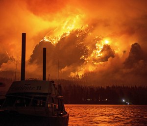 A teen who started a massive wildfire in Oregon has been ordered by a judge to pay nearly $37 million over the next decade. (Photo/AP)
