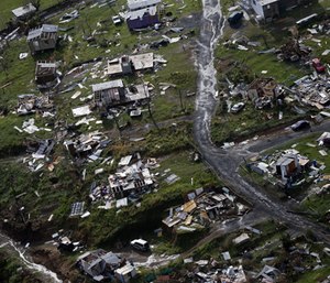 Debris scatters a destroyed community in the aftermath of Hurricane Maria in Toa Alta, Puerto Rico.