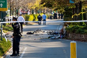 Bicycles and debris lay on a bike path after a motorist drove onto the path near the World Trade Center memorial, striking and killing several people Tuesday, Oct. 31, 2017, in New York.