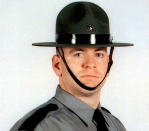 In this undated photo released by the Pennsylvania State Police, Cpl. Seth J. Kelly, is shown. (Pennsylvania State Police via AP Photo)