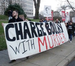 Protesters demonstrate, Monday, Nov. 27, 2017, in Hartford, Conn., to call for criminal charges against Bridgeport police officer James Boulay,who fatally shot 15-year-old Jayson Negron and wounded another man in May.