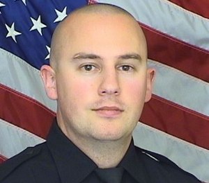 This undated photo provided by the Douglas County Sheriff's Office shows Sheriff's Deputy Zackari Parrish.