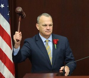 House speaker Richard Corcoran, R-Land O'Lakes, pounds the gavel to start the first day of legislative session, Tuesday, Jan. 9, 2018, in Tallahassee, Fla. (AP Photo/Steve Cannon)