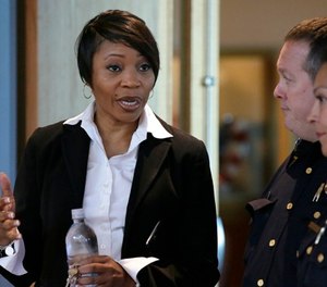 In this Sept. 7, 2017 photo, new Dallas Police Chief U. Reneé Hall talks during an applicant processing event at police headquarters in Dallas. (AP Photo/LM Otero, File)