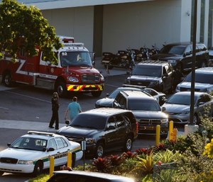 Police and rescue vehicles are shown outside Broward Health North hospital, Wednesday, Feb. 14, 2018, in Deerfield Beach, Fla.