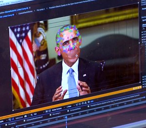 This image made from video of a fake video featuring former President Barack Obama shows elements of facial mapping used in new technology that lets anyone make videos of real people appearing to say things they've never said.
