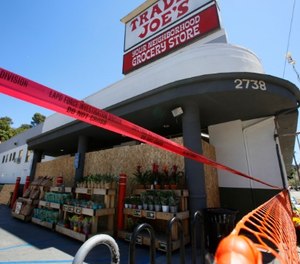 The July 21 incident left one dead, 27-year-old store manager Melyda Corado. (AP Photo/Damian Dovarganes)
