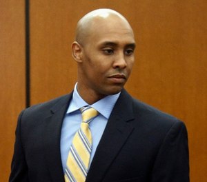 In this May 8, 2018, file photo, Mohamed Noor arrives at the Hennepin County Government Center for a hearing in Minneapolis. (AP Photo/Jim Mone, File)