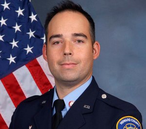 Authorities say Flynn, a 13-year veteran of the department, died after he fell through the floor at a burning Clarksville, Maryland home and was trapped for 22 minutes. (Howard County, Md., Fire and Rescue Department via AP)