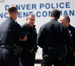Colo. LEOs, collaborating with federal agents, arrested 156 suspected violent fugitives. (AP Photo/David Zalubowski)