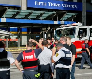 Emergency personnel and police respond to reports of an active shooter situation near Fountain Square, Thursday, Sept. 6, 2018, in downtown Cincinnati.