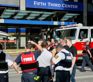 In this Sept. 6, 2018, file photo, emergency personnel and police respond to reports of an active shooter situation near Fountain Square in downtown Cincinnati.