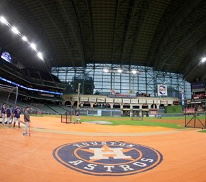 A dugout paramedic is suing the Houston Astros after he was struck by foul ball during the 2019 American League Championship Series. (AP Photo/Frank Franklin II)