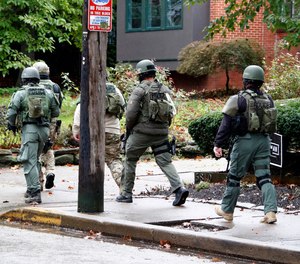A SWAT team arrives at the Tree of Life Synagogue inPittsburgh, Pa. where a shooter opened fire injuring multiple people, Saturday, Oct. 27, 2018.