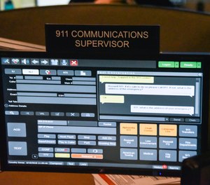 This file photo shows a 911 call center with one of the computer screens used by dispatchers showing a text message that has come into the system. New York City is expected to launch a text-to-911 service next summer, after years of delays.