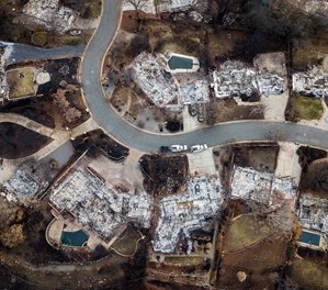 Homes leveled by the Camp Fire line Valley Ridge Drive in Paradise, Calif., on Monday, Dec. 3, 2018.