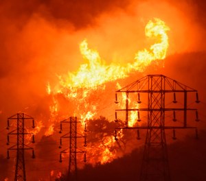 During a government shutdown, many federal firefighters are unable to perform vital steps to minimize the loss of life and property during what has become, in many areas, a year-long season of wildfires. (Photo/AP)