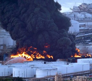 Firefighters battle a petrochemical fire at the Intercontinental Terminals Company Monday, March 18, 2019, in Deer Park, Texas. The large fire at a Houston-area petrochemicals terminal will likely burn for another two days, authorities said Monday, noting that air quality around the facility was testing within normal guidelines.