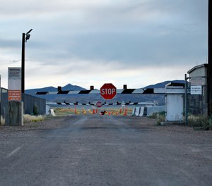 A sign warns about trespassing at an entrance to the Nevada Test and Training Range near Area 51 outside of Rachel, Nevada. Officials in Nevada's rural Lincoln County have drafted an emergency declaration and are planning with state officials to handle possible crowds that might arrive for an event next month dubbed