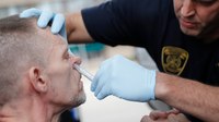 Should law enforcement be securing patients before naloxone is administered?