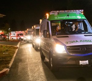 Ambulances arrive at Sutter Santa Rosa Regional Hospital to evacuate patients in Santa Rosa, Calif., on Saturday, Oct. 26, 2019. (AP Photo/Ethan Swope)