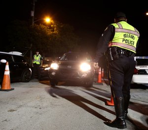 Checkpoints have long been a common tool for fighting impaired driving. (AP Photo/Lynne Sladky)