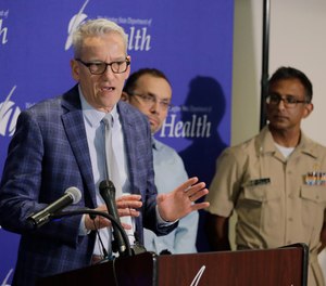 John Wiesman, Washington state Secretary of Health, speaks Wednesday, Jan. 22, 2020, during a news conference in Shoreline, Wash.