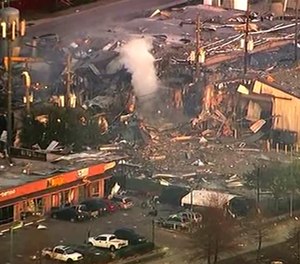This aerial photo taken from video provided by KTRK-TV shows damage to buildings after an explosion in Houston on Friday, Jan. 24, 2020. A large explosion left rubble scattered in the area, damaged nearby homes and was felt for miles away. A fire continues to burn and people have been told to avoid the area. (Photo/KTRK-TV via AP)