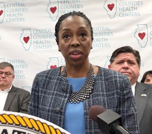Dr. Ngozi Ezike, director of the Illinois Department of Public Health, discusses the discovery of a second case in Illinois of the novel coronavirus and the public health efforts to contain and study it, Friday, Jan. 24, 2020 in Springfield, Ill.,
