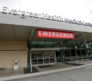 EvergreenHealth Medical Center is seen Saturday, Feb. 29, 2020, where a person died of COVID-19, in Kirkland, Wash.