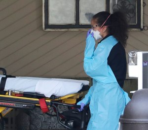 Twenty-five firefighters and two police officers are believed to have possibly come in contact with the coronavirus at Life Care Center of Kirkland, a nursing and rehab facility, where dozens of residents and staff are reporting symptoms.