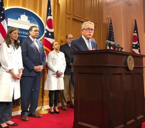 Ohio Gov. Mike DeWine speaks at a news conference at the statehouse in Columbus, Ohio, Tuesday, March 3, 2020. Ohio lawmakers have proposed a bill that would require hospitals and health departments to notify first responders of COVID-19 exposure. (AP Photo/Julie Carr Smyth)