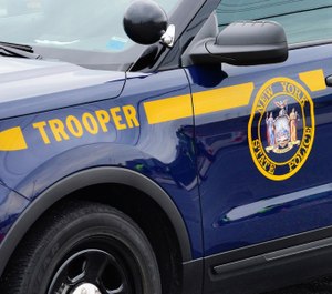 State troopers assist at a coronavirus testing site on Staten Island, New York City on March 20, 2020. (Photo/John Nacion/STAR MAX via AP)