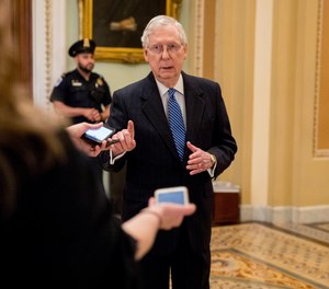 Senate Majority Leader Mitch McConnell of Ky. speaks to reporters outside the Senate chamber after Democrats block a coronavirus aid package on Capitol Hill, Monday, March 23, 2020, in Washington.