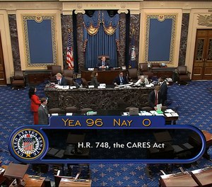 In this image from video, the final vote of 96-0 shows passage of the $2.2 trillion economic rescue package in response to coronavirus pandemic, passed by the Senate at the U.S. Capitol in Washington, Wednesday, March 25, 2020. Several Ohio mayors, whose cities were not included in the $150 billion in funding allocated to municipalities through the CARES Act, say they will have to make public safety cuts if they are not included in the next relief package.