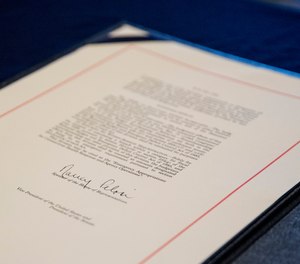 The Coronavirus Aid, Relief, and Economic Security (CARES) Act after it passed in the House on Capitol Hill. The $2.2 trillion package was then signed by President Donald Trump.
