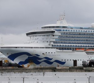 In this March 15, 2020, file photo, the Grand Princess cruise ship is shown docked at the Port of Oakland in Oakland, Calif. Two passengers, including retired Dallas Firefighter Michael Dorety, and a crew member on board the ship have died from COVID-19, while at least 103 tested positive for the coronavirus. (AP Photo/Jeff Chiu, File)