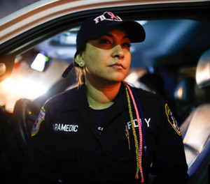 FDNY Paramedic Elizabeth Bonilla sits in her ambulance between calls on April 15, 2020, in the Bronx. Bonilla is one of four EMS providers who claim in a lawsuit the FDNY violated their First Amendment rights by retaliating against them after they spoke publicly during the COVID-19 pandemic.