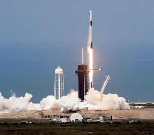 A SpaceX Falcon 9, with NASA astronauts Doug Hurley and Bob Behnken in the Dragon crew capsule, lifts off from Pad 39-A at the Kennedy Space Center in Cape Canaveral, Fla., Saturday, May 30, 2020.