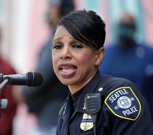 Seattle Police Chief Carmen Best speaks at a prayer vigil Monday, June 1, 2020 in Seattle following a weekend of George Floyd protests. (AP Photo/Elaine Thompson)