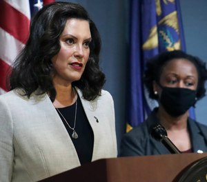 Michigan Gov. Gretchen Whitmer addresses the state during a speech in Lansing, Mich., Wednesday, June 17, 2020. A supplemental funding bill negotiated between Whitmer and state lawmakers will provide state departments with an additional $880 million.
